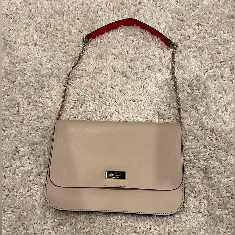Kate Spade never used shoulder clutch.